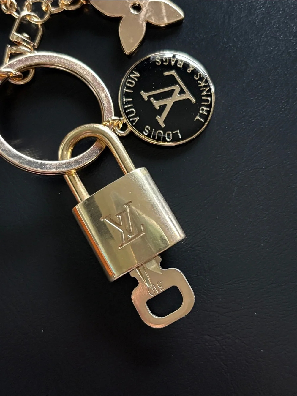 LV lock and button charm with keychain